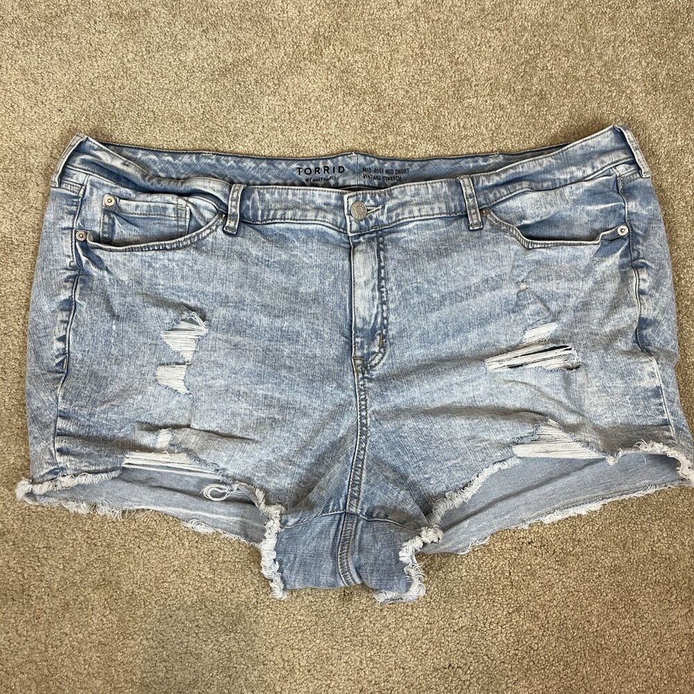 Torrid women's Jean Mid Shorts SIZE 26‎ Mid Rise Stretchy Distressed Frayed Hem